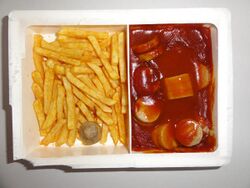 Ready to eat microwave food (TV dinner) Currywurst with French fries.JPG