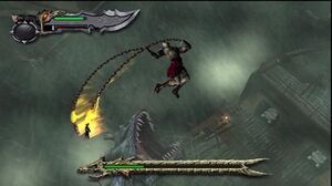 Character Kratos attacks a sea-monster while falling in the air.