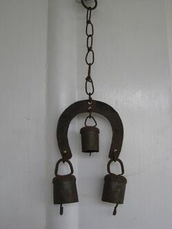 Horseshoe shaped wind chime with bells.jpg