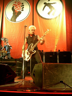 Mike Dirnt and Tré Cool performing at Cardiff.png