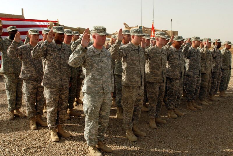 File:US Army 52421 CAMP TAJI, Iraq - Forty-one Soldiers of the 1st Battalion, 82nd Field Artillery Regiment, 1st Brigade Combat Team, 1st Cavalry Division, raise their right hands during a re-enlistment ceremony held at.jpg