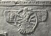 A Neo-Assyrian "feather robed archer" figure, symbolizing Ashur