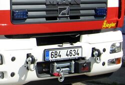 Front of a MAN fire engine with winch and shackles.jpg
