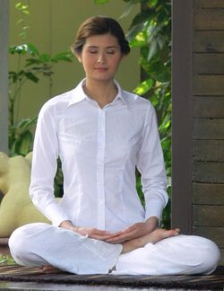 Thai woman meditating.jpg