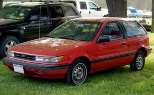 1989 Dodge Colt E in Red, front left.jpg