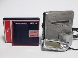 Sony MZ-NH1 Hi-MD Walkman and Hi-MD disc.jpg