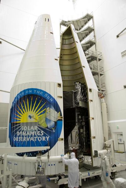 File:Second half of the payload fairing moved around SDO.jpg