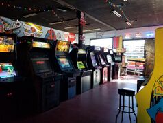 Several arcade game machines in a row