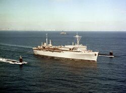 USS Dixon (AS-37) departs San Diego with USS Gurnard (SSN-662) and USS Guitarro (SSN-665) on 17 September 1990 (6464588).jpg
