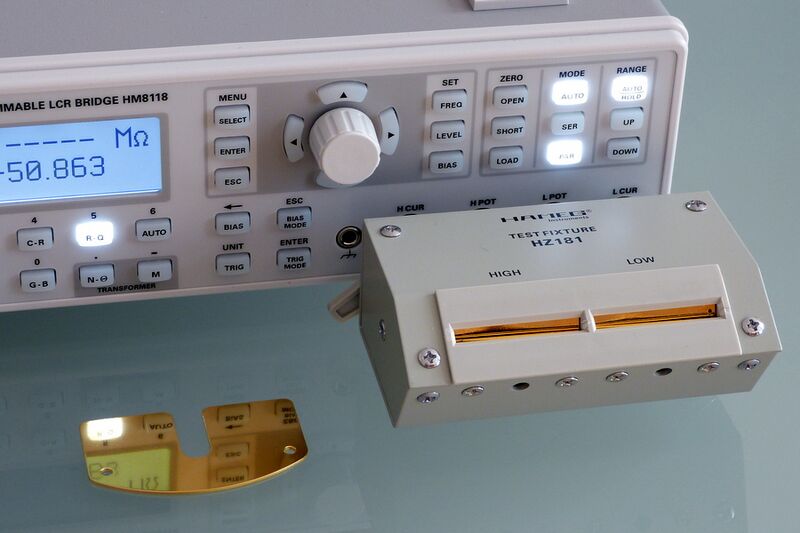 File:Benchtop LCR meter with attached fixture.JPG