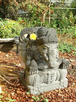 Ganesh with flower.jpg