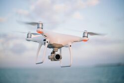 Quadcopter camera drone in flight.jpg