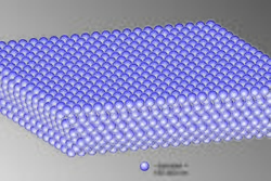 A diagram of an opal's molecular structure, showing small lilac spheres packed in misaligned sheets on top of each other. The legend shows that one sphere has a diameter of 150–300 nanometres.