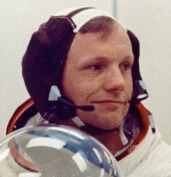 Neil Armstrong wearing a Snoopy cap