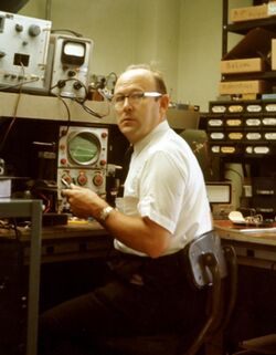 Keneth Alden Simons at his Jerrold Electronics workbench in the 1960s