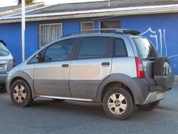 " 08 - Italian XUV - Fiat Idea Adventure Brasil (Sud America) grey facing left - blue house.jpg