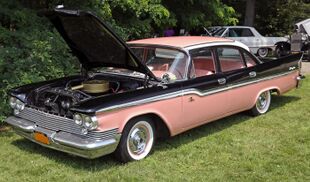 1959 Chrysler Windsor 4-dr sedan, front left pink & black.jpg