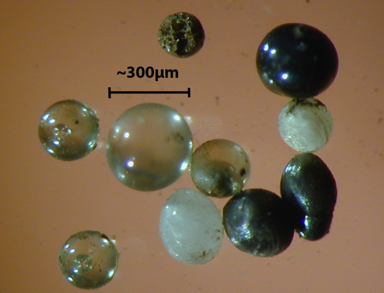 File:Light microscope images of stony cosmic spherules.png