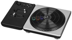 A black turntable with three buttons on the rotating deck.