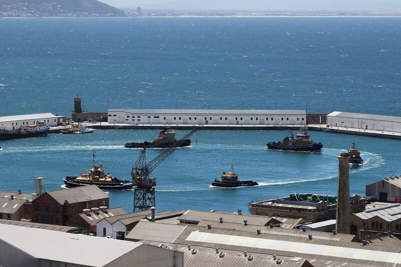 File:South African naval tugs welcoming a new member.jpg