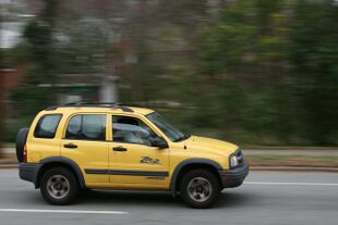 2009-03-11 Yellow Chevy Tracker on N Gregson St in Durham.jpg