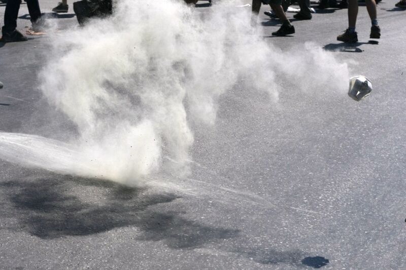File:Exploded tear gas can on the fly.jpg