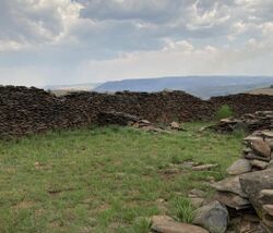 Bokoni stone ruins with Mpumalanga landscape in the background