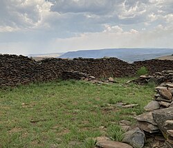 Bokoni stone ruins with Mpumalanga landscape in the background