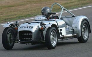 Chris Rea driving Lotus 6 at the Goodwood Revival 2009.jpg