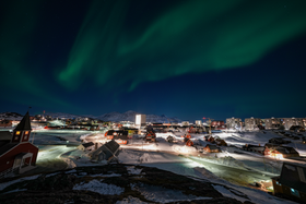 Nuuk, Greenland skyline at night under the northern lights (Quintin Soloviev).png