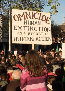 Placard against human extinction, Extinction Rebellion (cropped).jpg