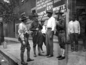 Soldiers with Black Resident of Washington, D.C., 1919.png