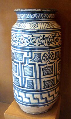 Blue and white faience albarello with designs derived from Kufic script Toscane 2nd half 15th century.jpg