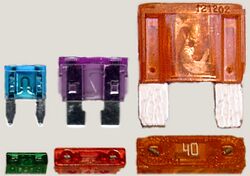 Electrical fuses, plug-in type, different sizes.jpeg