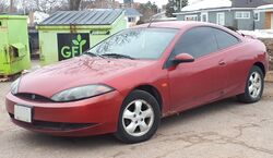 2000 Mercury Cougar V6 in Laser Red Metallic, Front Left, 03-27-2019.jpg