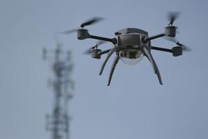 Small quadcopter drone in flight