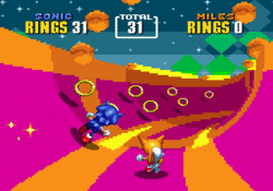 From a third-person perspective, Sonic and Tails run through a pink-and-orange halfpipe while collecting golden rings.