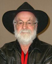 Bearded man with hat and leather jacket