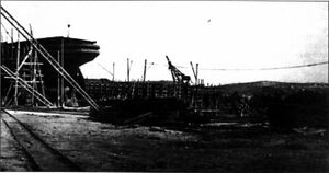 Incomplete Number 64-class cruiser, in drydock. 1915.jpg