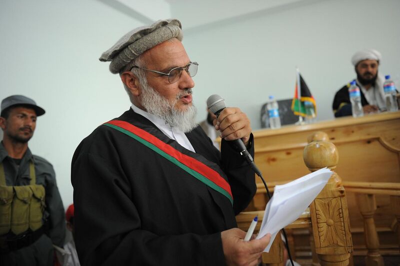 File:The prosecuting attorney making a statement during a public criminal trial at the courthouse in Asadabad.jpg