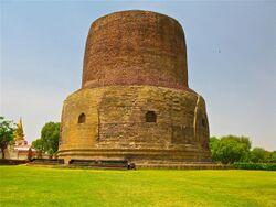 Dhamekh Stupa, where the Buddha gave the first sermon on the Four Noble Truths and the Eightfold Path to his five disciples, Sarnath.jpg