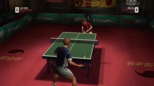 The player character competing against an opponent in a game of table tennis. The head-up display elements are visible on-screen.