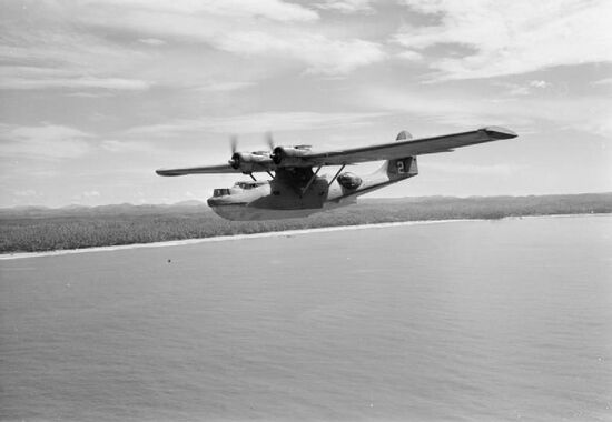 The QEA Catalina G-AGFL "Altair Star" flying along the coast of Ceylon at the conclusion of a 'Double Sunrise' flight from Australia which operated from July 1943-July 1945.