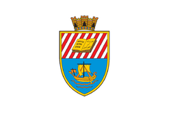 A white flag with a shield at its center. The shield's upper party is a bendy sinister gules and argent flanked by an open book. The lower party features a sail ship on azure background. The shield is topped by a fortress.