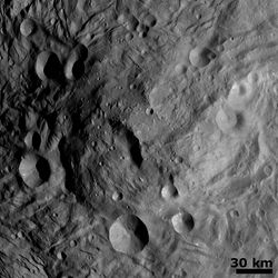 Central Mound at the South Pole on the asteroid Vesta image of NASA’s Dawn spacecraft 14f2 311811321 detail.jpg