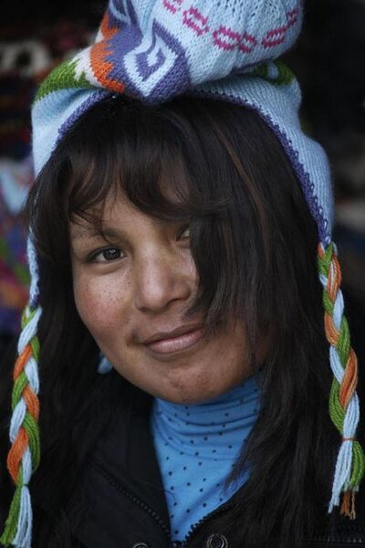 File:Peruvian woman in hat smiling.jpg