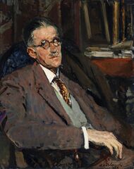 seated portrait of James Joyce in a suit. He is in three-quarters view looking left, wearing a suit. Table with books is in background on the right.