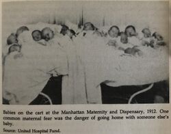 Babies on a cart at Manhattan Maternity and Dispensary in 1912.jpeg