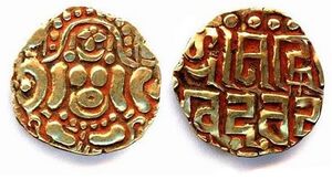 A Kalachuri-style 'seated goddess' coin of Govindachandra (r. c. 1114–1155 CE). 4​1⁄2 masha, gold. Obv: Four-armed Lakshmi seated cross-legged on lotus on obverse side holding a lotus in the upper two hands. Rev: Inscription in Nagari script :'Shrimad-Govindachandra'. of Gāhaḍavālas