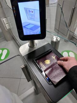 Automated Passport Check at Rome Fiumicino with instruction screen.jpg